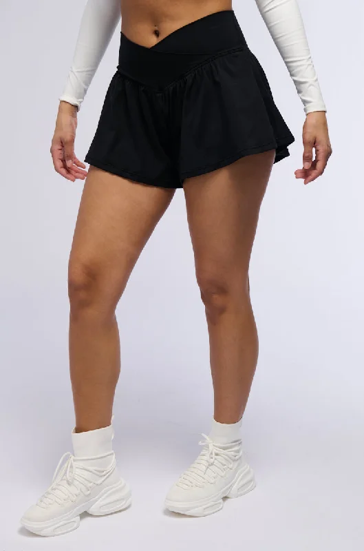 Bermuda shorts – Knee-length shorts that offer a more conservative and comfortable fit.Bermuda shorts – Knee-length shorts that offer a more conservative and comfortable fit.ON THE MOVE RUFFLE SHORT IN BLACK Bermuda shorts – Knee-length shorts that offer a more conservative and comfortable fit.Bermuda shorts – Knee-length shorts that offer a more conservative and comfortable fit.ON THE MOVE RUFFLE SHORT IN BLACK