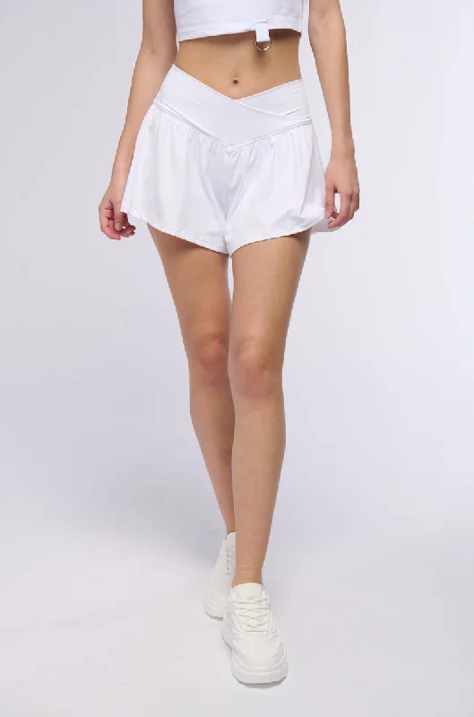 Tye-dye shorts – Shorts with a colorful, spiral tie-dye pattern, perfect for a retro or festival vibe.Tye-dye shorts – Shorts with a colorful, spiral tie-dye pattern, perfect for a retro or festival vibe.ON THE MOVE RUFFLE SHORT IN WHITE Tye-dye shorts – Shorts with a colorful, spiral tie-dye pattern, perfect for a retro or festival vibe.Tye-dye shorts – Shorts with a colorful, spiral tie-dye pattern, perfect for a retro or festival vibe.ON THE MOVE RUFFLE SHORT IN WHITE