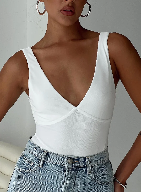 Zip-front vest – Vest with a front zipper closureZip-front vest – Vest with a front zipper closureNellie Bodysuit White Zip-front vest – Vest with a front zipper closureZip-front vest – Vest with a front zipper closureNellie Bodysuit White