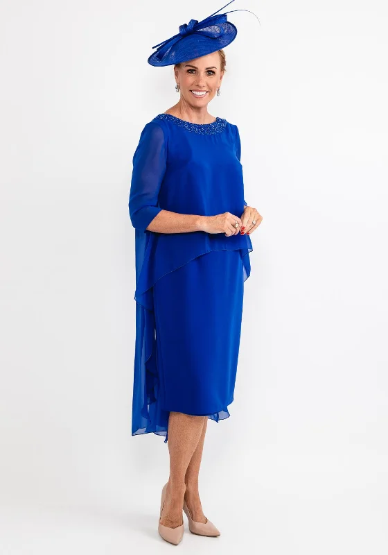 Tea-length dress – Dress that falls between the knee and ankle, perfect for more formal or vintage-inspired occasions.Tea-length dress – Dress that falls between the knee and ankle, perfect for more formal or vintage-inspired occasions.Gabriela Sanchez Draped Chiffon Cape Dress, Cobalt Blue Tea-length dress – Dress that falls between the knee and ankle, perfect for more formal or vintage-inspired occasions.Tea-length dress – Dress that falls between the knee and ankle, perfect for more formal or vintage-inspired occasions.Gabriela Sanchez Draped Chiffon Cape Dress, Cobalt Blue