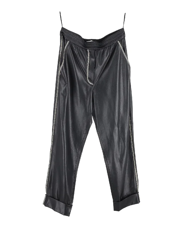 Slim-fit trousers – Trousers that are form-fitting and narrow through the legs.Slim-fit trousers – Trousers that are form-fitting and narrow through the legs.Nanushka Elastic-Waist Trousers in Black Faux Leather Slim-fit trousers – Trousers that are form-fitting and narrow through the legs.Slim-fit trousers – Trousers that are form-fitting and narrow through the legs.Nanushka Elastic-Waist Trousers in Black Faux Leather