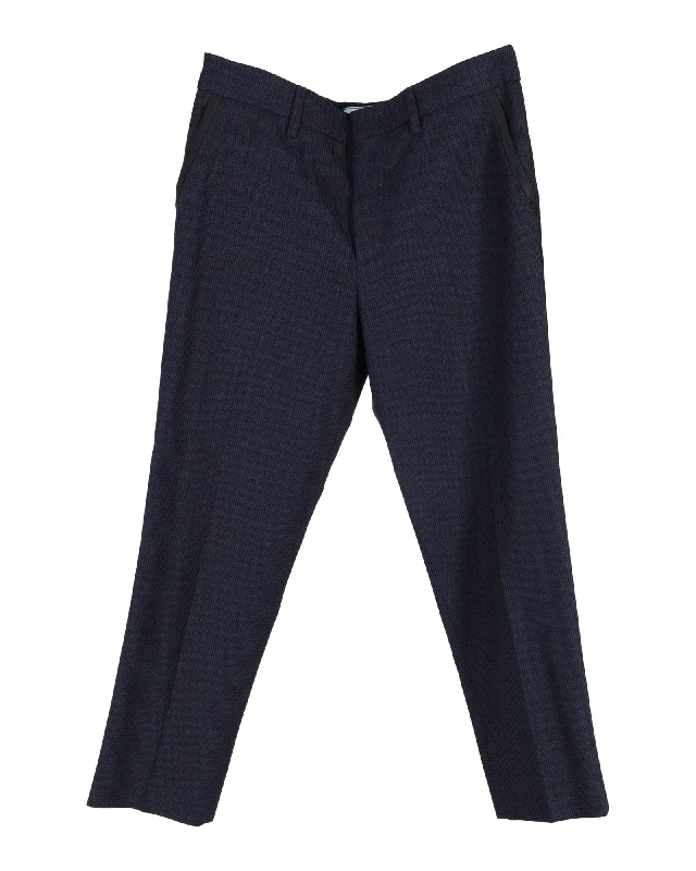 Cropped trousers – Trousers that are shortened to a length above the ankle.Cropped trousers – Trousers that are shortened to a length above the ankle.Prada Checked Straight-Leg Trousers in Navy Blue Wool