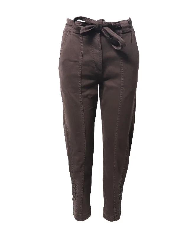 Pleated trousers – Trousers with folds or pleats in the front, often adding volume or texture to the garment.Pleated trousers – Trousers with folds or pleats in the front, often adding volume or texture to the garment.Ulla Johnson Carmen High Rise Tapered Jeans in Brown Cotton Pleated trousers – Trousers with folds or pleats in the front, often adding volume or texture to the garment.Pleated trousers – Trousers with folds or pleats in the front, often adding volume or texture to the garment.Ulla Johnson Carmen High Rise Tapered Jeans in Brown Cotton