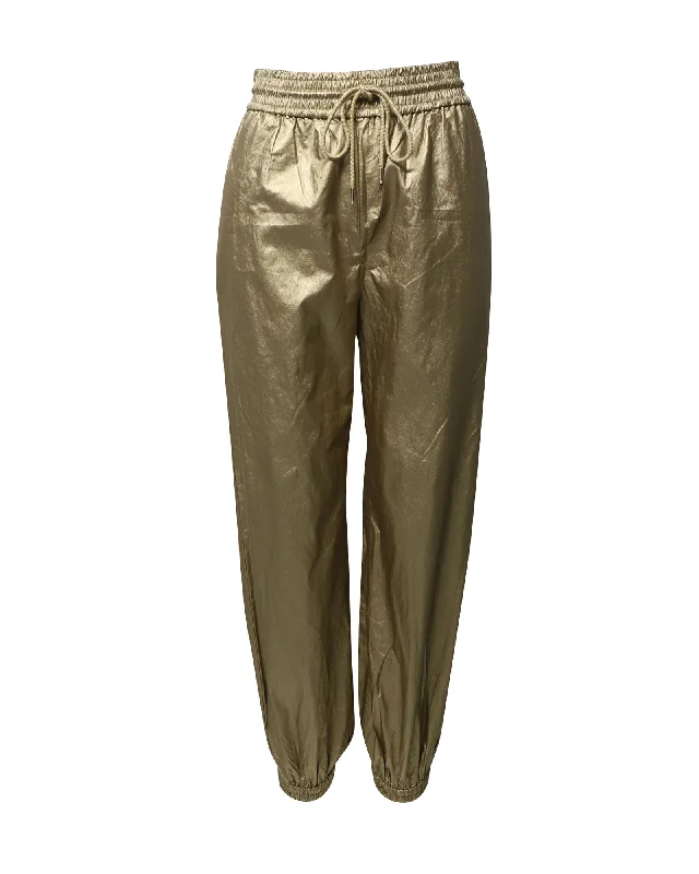 Flared trousers – Trousers with a gradual flare from the knee down, often associated with retro or 1970s fashion.Flared trousers – Trousers with a gradual flare from the knee down, often associated with retro or 1970s fashion.Zimmermann Rhythmic Drawstring Pants in Gold Viscose Flared trousers – Trousers with a gradual flare from the knee down, often associated with retro or 1970s fashion.Flared trousers – Trousers with a gradual flare from the knee down, often associated with retro or 1970s fashion.Zimmermann Rhythmic Drawstring Pants in Gold Viscose