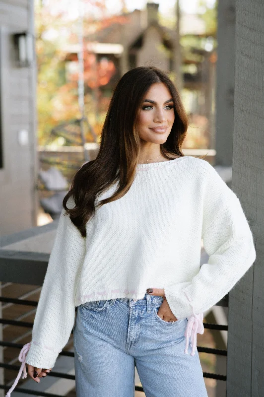 Fitted – Snug, form-fitting styleFitted – Snug, form-fitting styleLace Up Tie Sweater-Ivory/Pink Fitted – Snug, form-fitting styleFitted – Snug, form-fitting styleLace Up Tie Sweater-Ivory/Pink