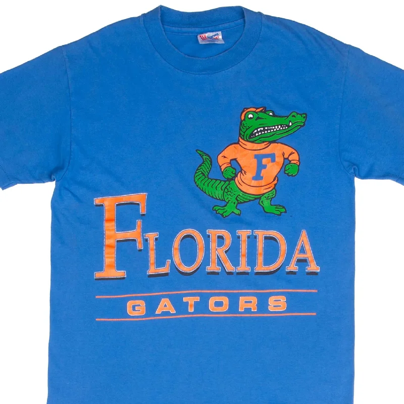 Henley – T-shirt with a buttoned placket (usually a few buttons near the collar)Henley – T-shirt with a buttoned placket (usually a few buttons near the collar)VINTAGE NCAA FLORIDA GATORS 1990S TEE SHIRT SIZE MEDIUM MADE IN USA Henley – T-shirt with a buttoned placket (usually a few buttons near the collar)Henley – T-shirt with a buttoned placket (usually a few buttons near the collar)VINTAGE NCAA FLORIDA GATORS 1990S TEE SHIRT SIZE MEDIUM MADE IN USA
